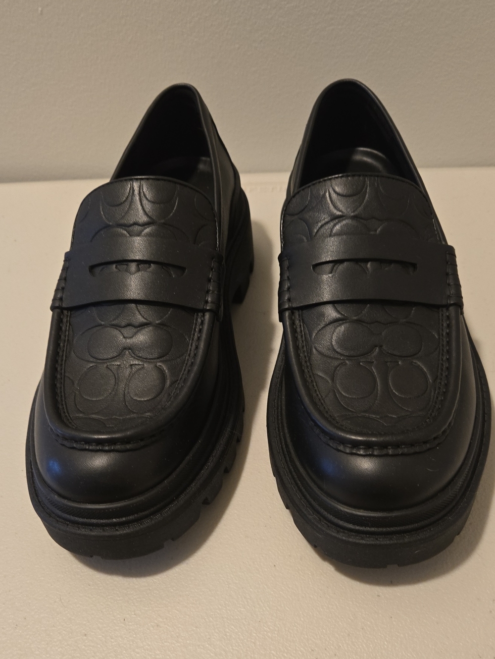 Coach Black Embossed Leather Penny Loafers